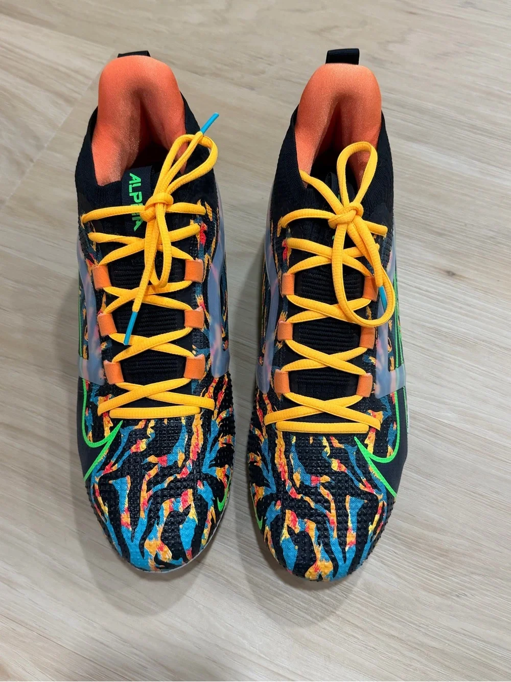 Nike Alpha Menace 4 Elite Cleat Travis Kelce Black, Orange, Yellow, Green, Blue